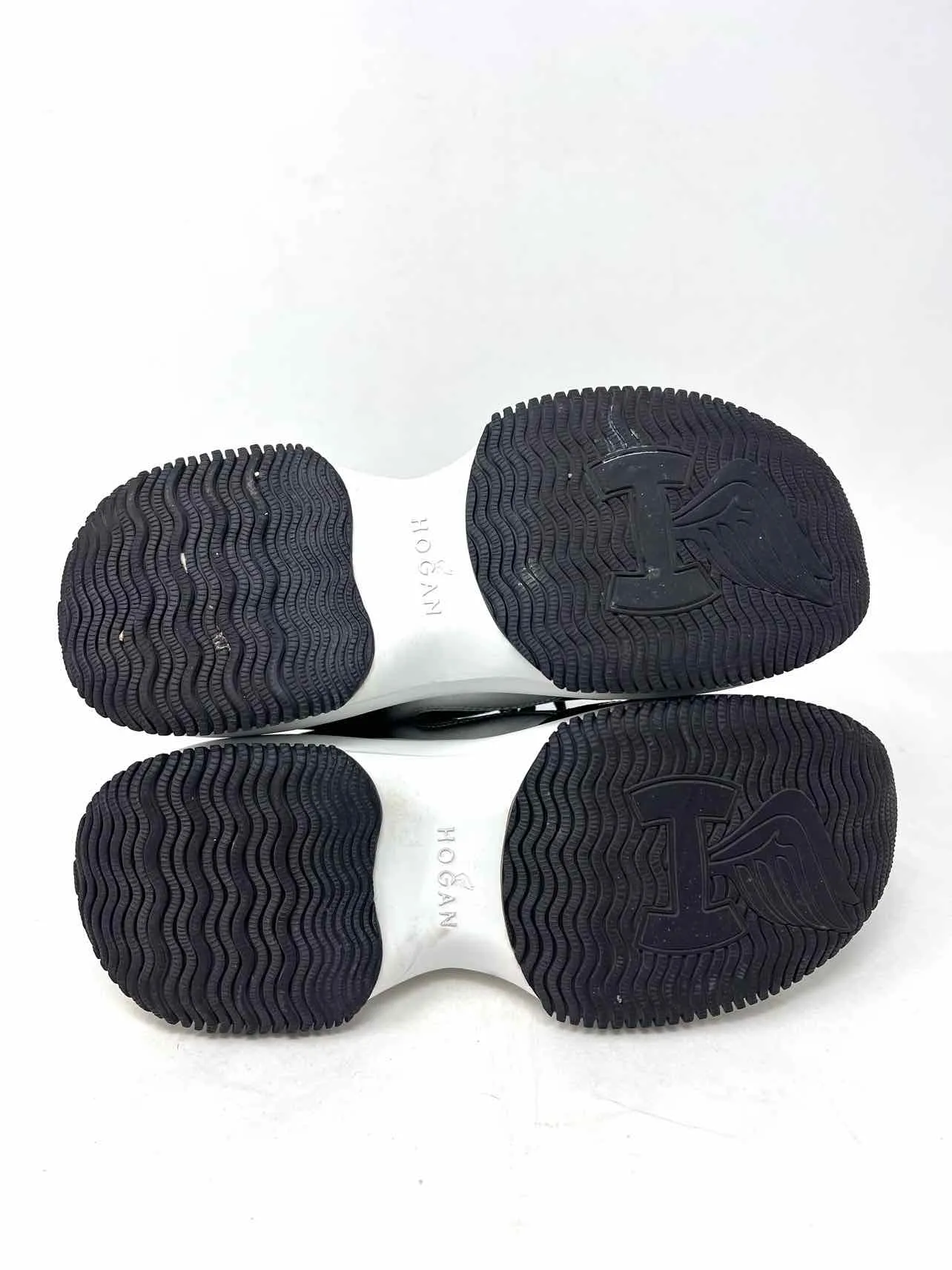 Chaussures de sport designer Hogan taille 6 à lacets, bicolores noir et argent